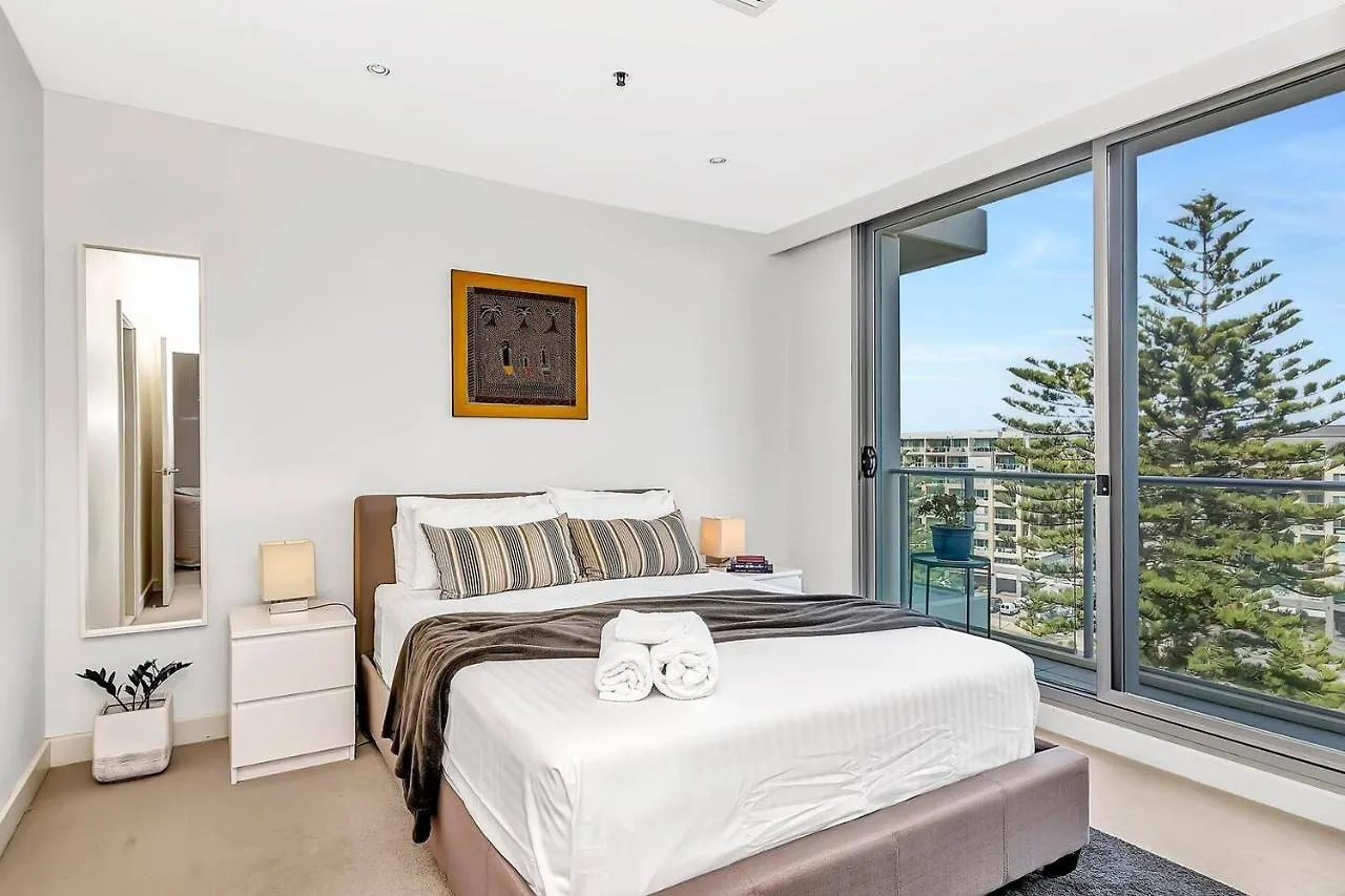 Waterfront Resort-Style Living At Glenelg Beach Adelaide